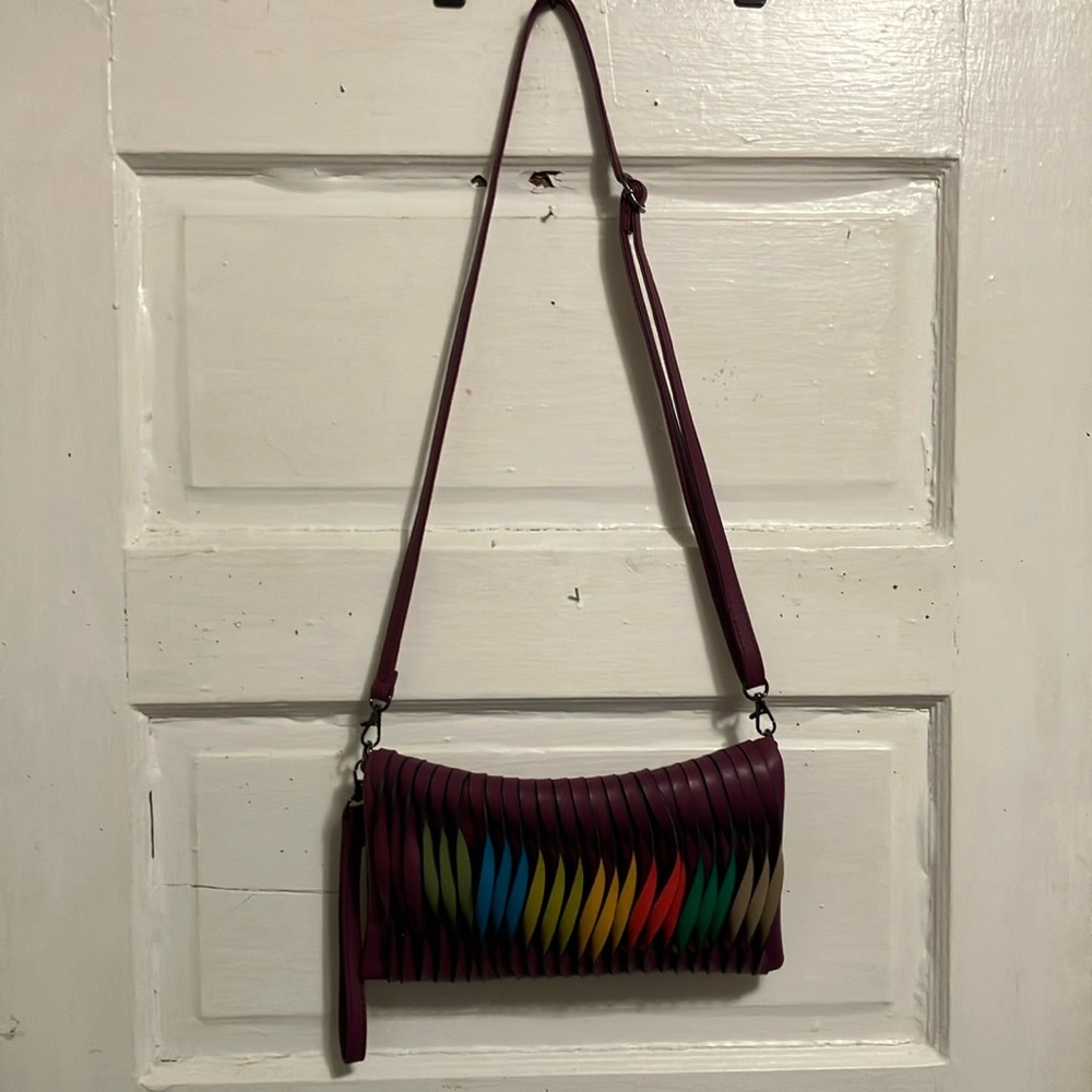 New.  Perfect condition. Mellow World multi style. Wine n various colors faux